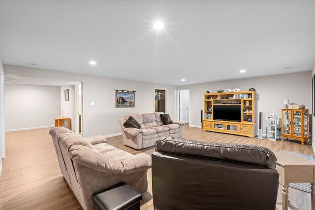 1355 Bloomfield Dr, Eureka, MO 63025 - living room with wood finished floors, recessed lighting, and baseboards