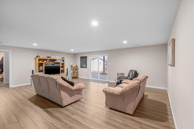 1355 Bloomfield Dr, Eureka, MO 63025 - living area with light wood-type flooring, recessed lighting, and baseboards