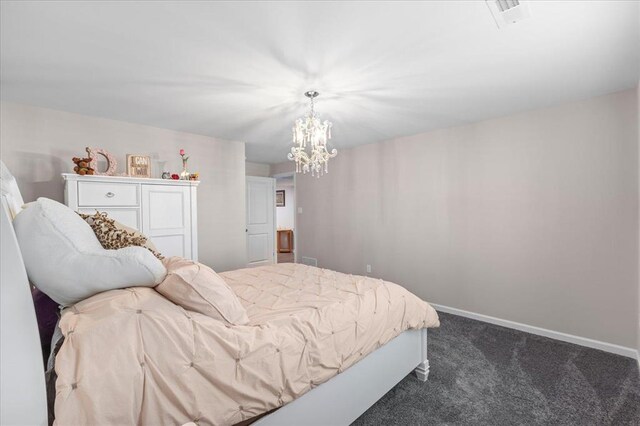 1355 Bloomfield Dr, Eureka, MO 63025 - bedroom featuring dark colored carpet, a chandelier, and baseboards
