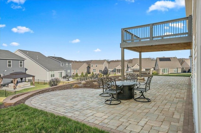 1355 Bloomfield Dr, Eureka, MO 63025 - view of patio / terrace featuring a residential view, outdoor dining space, a gazebo, and a deck