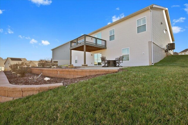1355 Bloomfield Dr, Eureka, MO 63025 - rear view of house featuring a lawn and a patio area