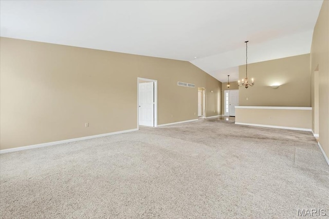 1423 Villas Estates Dr, Saint Louis, MO 63026 - unfurnished living room with a chandelier, lofted ceiling, and carpet
