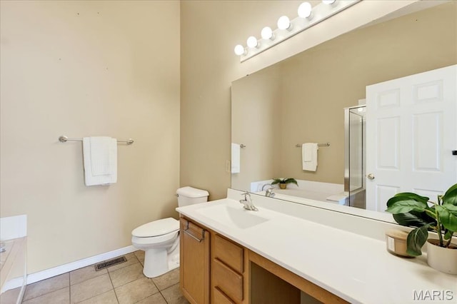 1423 Villas Estates Dr, Saint Louis, MO 63026 - bathroom with a garden tub, a stall shower, tile patterned flooring, and vanity
