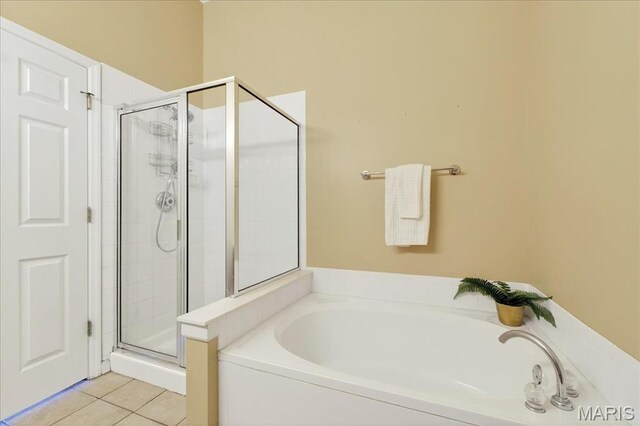 1423 Villas Estates Dr, Saint Louis, MO 63026 - full bath featuring a stall shower, a bath, and tile patterned floors