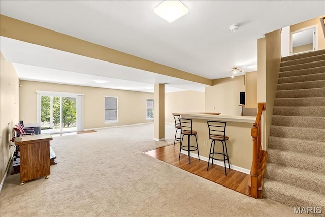 1423 Villas Estates Dr, Saint Louis, MO 63026 - bar area featuring light colored carpet and stairs