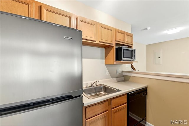 1423 Villas Estates Dr, Saint Louis, MO 63026 - kitchen featuring appliances with stainless steel finishes, light countertops, and electric panel