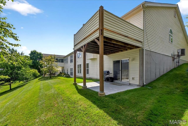 1423 Villas Estates Dr, Saint Louis, MO 63026 - rear view of house with a lawn and a patio