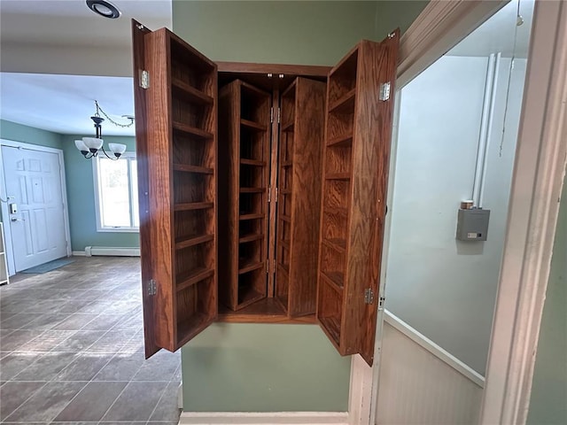 417 S Kingshighway St, Sikeston, MO 63801 - mudroom with a baseboard radiator, a chandelier, and baseboards