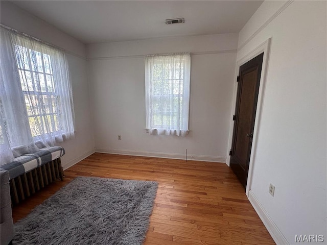 417 S Kingshighway St, Sikeston, MO 63801 - unfurnished bedroom featuring light wood-type flooring and baseboards