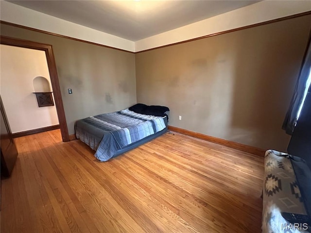 417 S Kingshighway St, Sikeston, MO 63801 - bedroom with light wood-style floors and baseboards