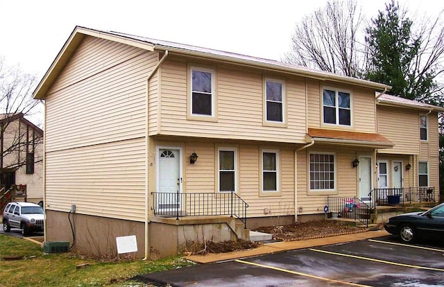 161 Dartingbird Ln Unit A, Eureka, MO 63025 - view of property featuring uncovered parking