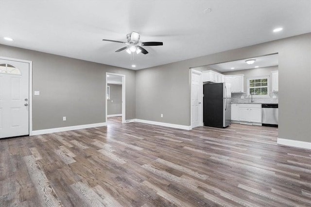113 Brand Ave, Red Bud, IL 62278 - unfurnished living room featuring ceiling fan, light wood-style flooring, recessed lighting, and baseboards