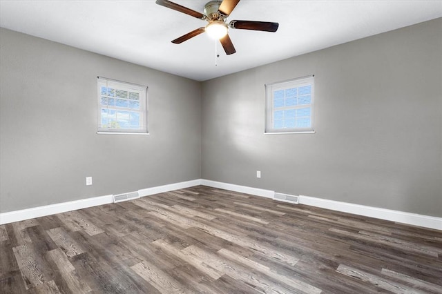 113 Brand Ave, Red Bud, IL 62278 - unfurnished room with baseboards, dark wood finished floors, and ceiling fan