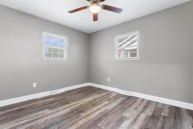 113 Brand Ave, Red Bud, IL 62278 - empty room featuring healthy amount of natural light, baseboards, and wood finished floors