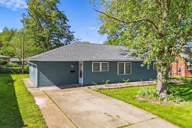 113 Brand Ave, Red Bud, IL 62278 - view of front of home featuring a shingled roof, a front yard, driveway, and an attached carport