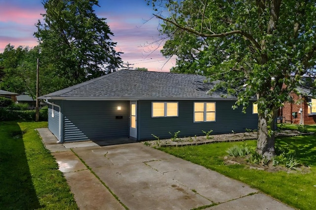 113 Brand Ave, Red Bud, IL 62278 - view of front of property featuring driveway, a front lawn, roof with shingles, and an attached carport