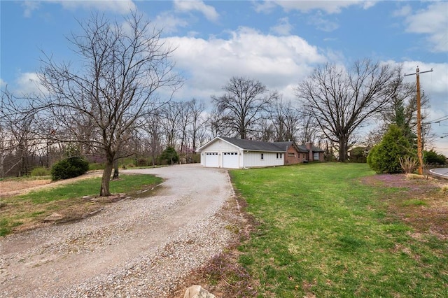 12810 Big Bend Rd, Kirkwood, MO 63122 - view of front of home with driveway, a front yard, and a garage