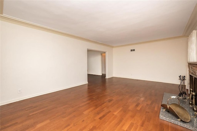 12810 Big Bend Rd, Kirkwood, MO 63122 - unfurnished living room featuring ornamental molding, wood finished floors, a fireplace, and baseboards