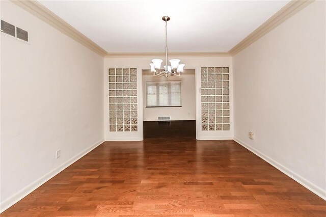 12810 Big Bend Rd, Kirkwood, MO 63122 - unfurnished dining area with a chandelier, ornamental molding, wood finished floors, and baseboards