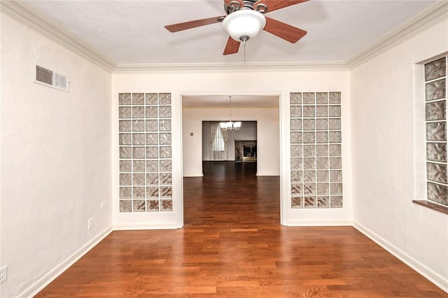 12810 Big Bend Rd, Kirkwood, MO 63122 - spare room with ornamental molding, wood finished floors, a ceiling fan, a chandelier, and baseboards