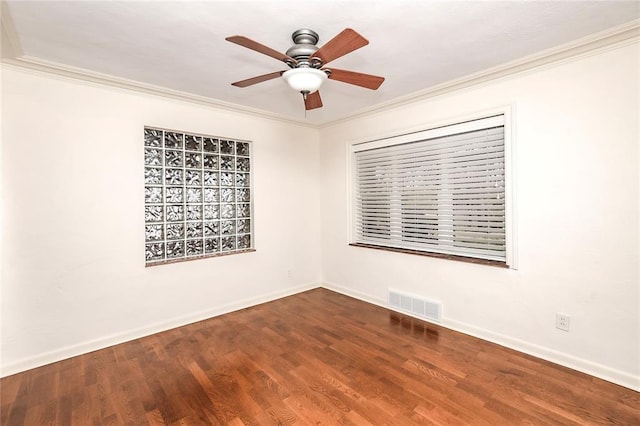12810 Big Bend Rd, Kirkwood, MO 63122 - spare room with crown molding, a ceiling fan, baseboards, and dark wood-style flooring