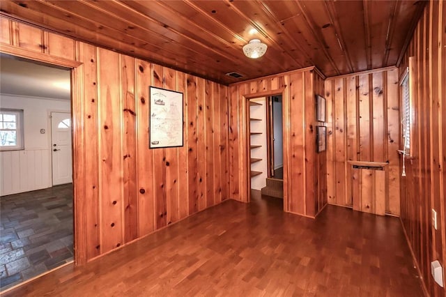 12810 Big Bend Rd, Kirkwood, MO 63122 - spare room with wooden walls, dark wood-style floors, and crown molding