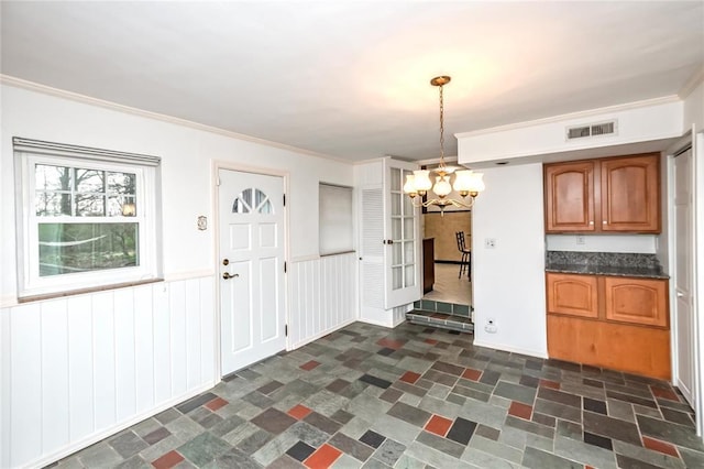 12810 Big Bend Rd, Kirkwood, MO 63122 - unfurnished dining area featuring a chandelier and crown molding
