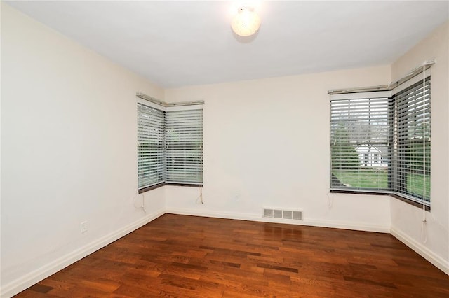 12810 Big Bend Rd, Kirkwood, MO 63122 - spare room featuring wood finished floors and baseboards
