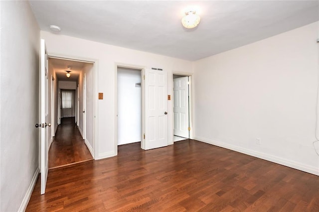 12810 Big Bend Rd, Kirkwood, MO 63122 - unfurnished bedroom featuring wood finished floors and baseboards