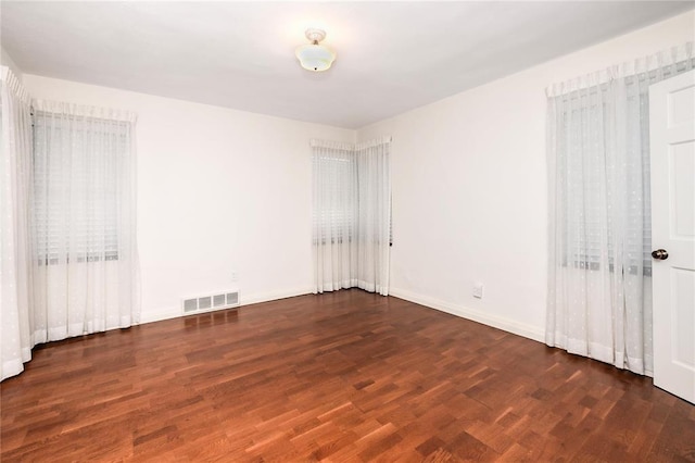 12810 Big Bend Rd, Kirkwood, MO 63122 - spare room featuring wood finished floors and baseboards