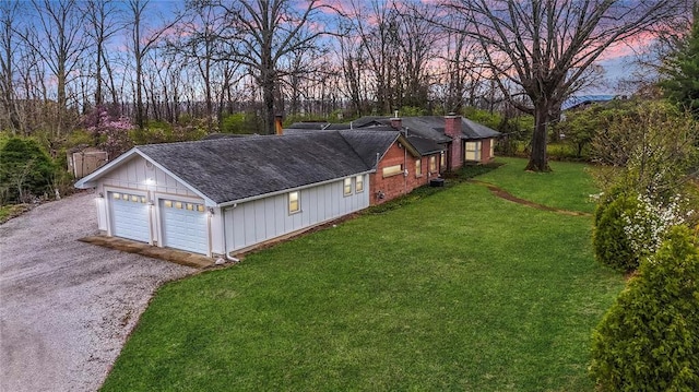 12810 Big Bend Rd, Kirkwood, MO 63122 - exterior space with a yard, driveway, and an attached garage