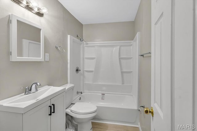 3368 S Suncrest Ave, Saint Louis, MO 63114 - bathroom with vanity, shower / washtub combination, and wood finished floors