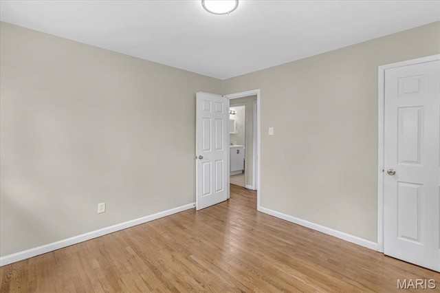 3368 S Suncrest Ave, Saint Louis, MO 63114 - unfurnished room featuring baseboards and light wood finished floors