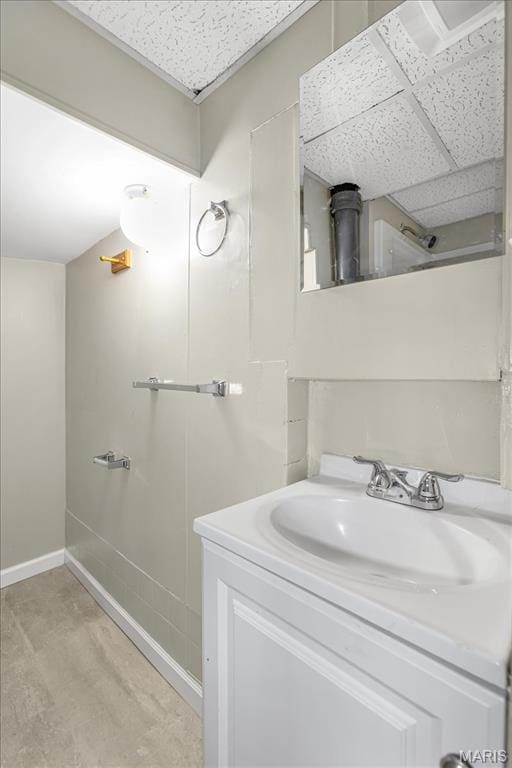 3368 S Suncrest Ave, Saint Louis, MO 63114 - bathroom with vanity and baseboards