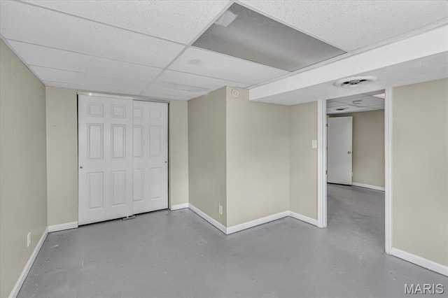 3368 S Suncrest Ave, Saint Louis, MO 63114 - finished below grade area with baseboards and a paneled ceiling