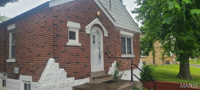 4209 Edgewood Blvd, Normandy, MO 63121 - view of front of home with brick siding and entry steps
