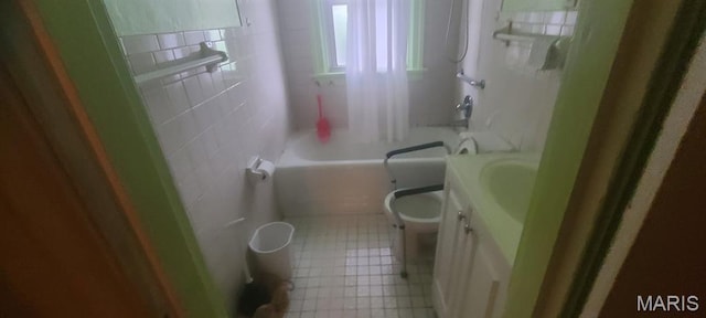 4209 Edgewood Blvd, Normandy, MO 63121 - full bathroom with vanity, toilet, tile walls, and bathing tub / shower combination