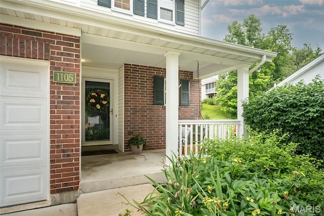 1105 Big Bend Crossing Dr, Manchester, MO 63088 - property entrance featuring covered porch and brick siding
