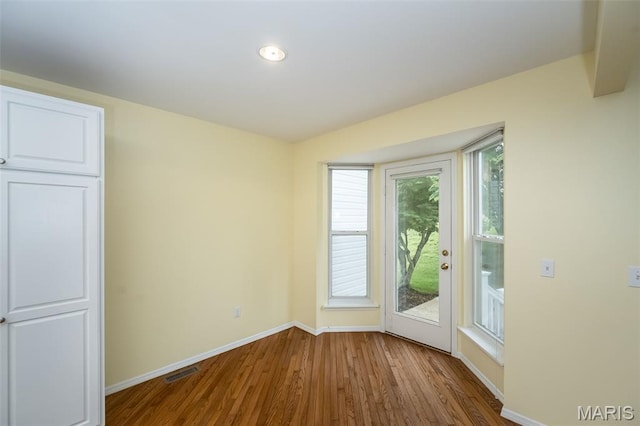 1105 Big Bend Crossing Dr, Manchester, MO 63088 - spare room with baseboards, wood finished floors, and recessed lighting