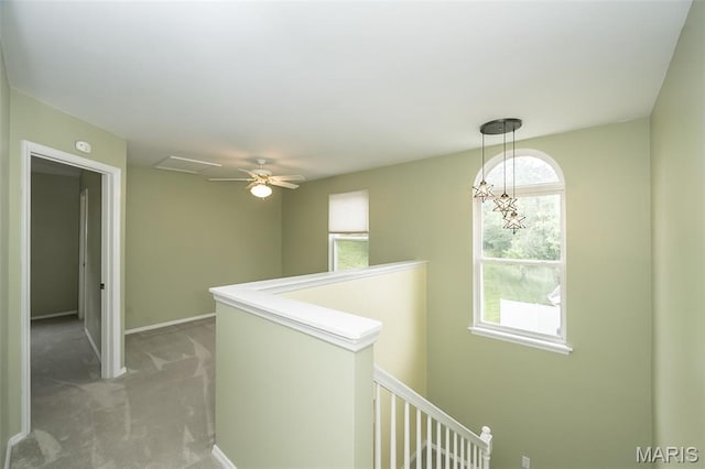 1105 Big Bend Crossing Dr, Manchester, MO 63088 - corridor with an upstairs landing, light carpet, and baseboards