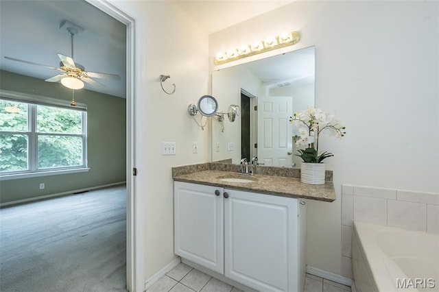 1105 Big Bend Crossing Dr, Manchester, MO 63088 - full bath featuring vanity, a bath, a ceiling fan, baseboards, and tile patterned floors