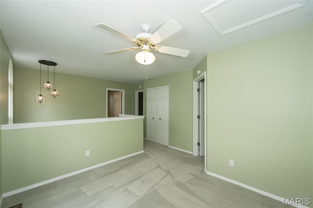 1105 Big Bend Crossing Dr, Manchester, MO 63088 - empty room with light carpet, baseboards, and a ceiling fan