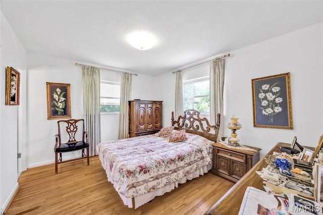 8967 New Sappington Rd, Crestwood, MO 63126 - bedroom featuring light wood finished floors and baseboards