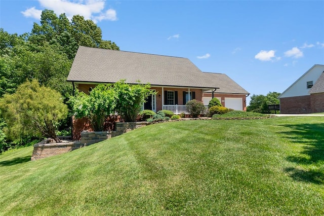 1014 Trailridge Dr, Jackson, MO 63755 - view of front facade featuring covered porch, a garage, a front lawn, and brick siding