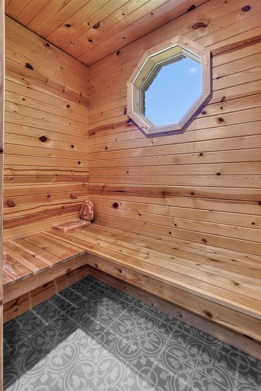 1014 Trailridge Dr, Jackson, MO 63755 - sauna featuring wood walls and a skylight