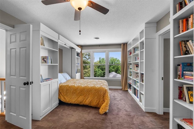 1014 Trailridge Dr, Jackson, MO 63755 - bedroom featuring dark colored carpet, a textured ceiling, and ceiling fan