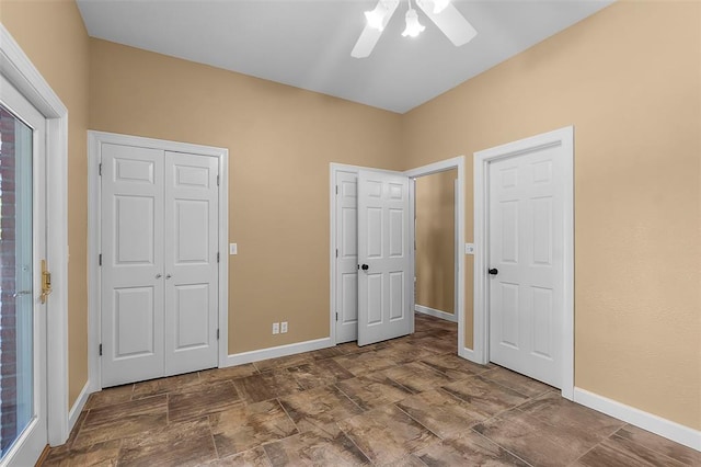 1014 Trailridge Dr, Jackson, MO 63755 - unfurnished bedroom with baseboards, ceiling fan, and stone finish floors