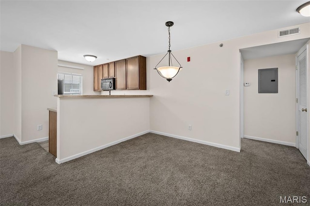 160 Brandy Mill Cir Unit 7C, High Ridge, MO 63049 - kitchen featuring black microwave, electric panel, and carpet floors
