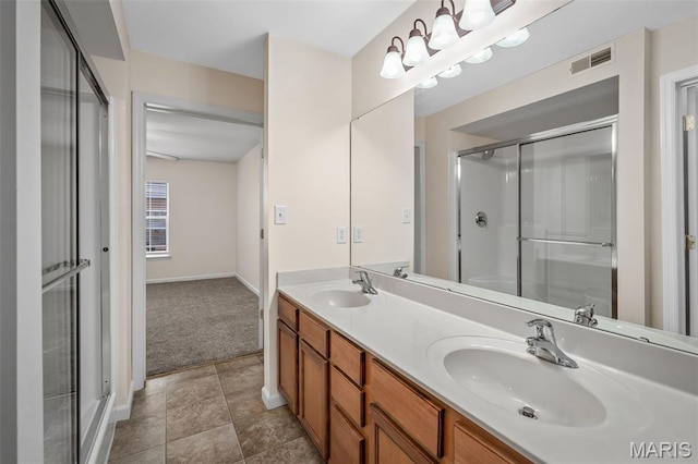 160 Brandy Mill Cir Unit 7C, High Ridge, MO 63049 - bathroom with double vanity and a shower with door
