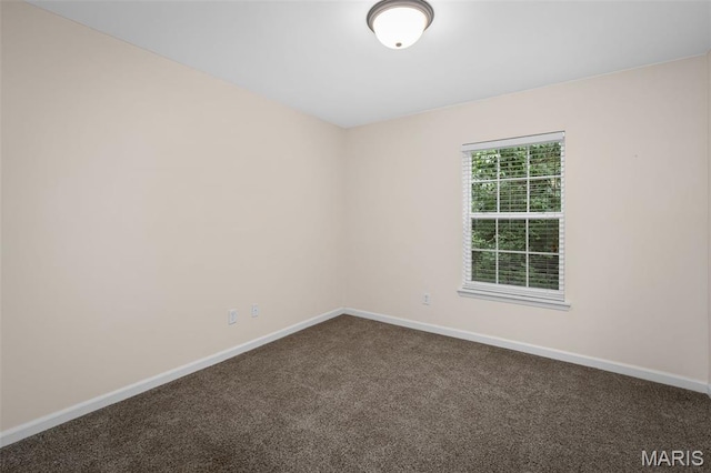 160 Brandy Mill Cir Unit 7C, High Ridge, MO 63049 - unfurnished room featuring dark colored carpet and baseboards